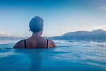 Backview of woman in lagoon waters