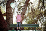 Child in costume of sheep head mask