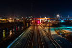 Bridge and rail track at night, Los Angeles, California, USA