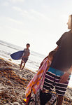 Father and children enjoying beach, Encinitas, California, USA