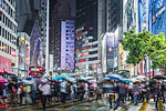 Crowded pedestrian crossing at night, Hong Kong, China