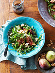 Still life of salad with walnuts, figs and gorgonzola