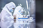 Workers testing ecigarettes in factory