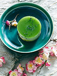 Still life with bowl of Japanese green tea cheesecake