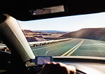 View from inside car driving in Monument Valley, Utah, USA