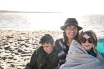 Mother with son and daughter on beach