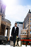 Businessman travelling in city, London, UK