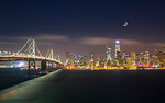 View of San Francisco skyline and Oakland Bay Bridge from Treasure Island at night, San Francisco, California, United States of America, North America
