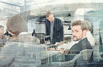 Business people work together in office. Concept of teamwork and partnership. double exposure