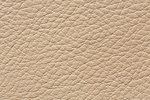 Clean leather texture in classic light colour. High resolution photo.