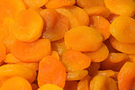 Orange and yellow dried halves of apricot fruits without seeds, dried apricots and eastern sweetness