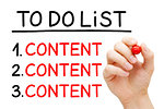 Hand writing Content in To Do List with red marker isolated on white.