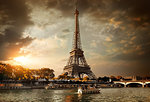 Eiffel Tower and bridge Iena on the river Seine in Paris, France.