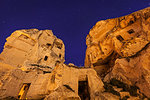 Cylindrical stone cliffs and cave houses in Goreme, Turkey