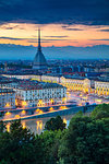 Aerial cityscape image of Turin, Italy during sunset.