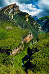 Overview of moutain gorge and jagged edged moutaintop in Ordesa y Monte Perdido National Park in the Pyrenees, Huesca, Aragon, Spain.