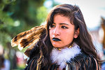 Young, female indigenous tribal dancer at a St Michael Archangel Festival parade in San Miguel de Allende, Mexico