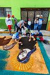 Men working on creating artwork for the Floral Carpet Festival in Uriangato, Guanajuato, Mexico