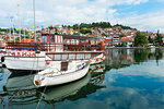 Boats reflecting on Ohrid Lake, Ohrid, UNESCO World Heritage Site, Macedonia, Europe