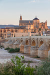 The Mosque-Cathedral (Great Mosque of Cordoba) (Mezquita) and the Roman Bridge at first light, UNESCO World Heritage Site, Cordoba, Andalusia, Spain, Europe