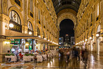 View of the interior of Galleria Vittorio Emanuele II illuminated at dusk, Milan, Lombardy, Italy, Europe