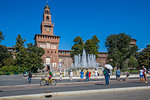 View of Sforzesco Castle and fountain on a sunny day, Milan, Lombardy, Italy, Europe