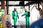 Firemen in discussion in training centre, Darlington, UK