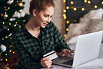 Woman shopping for Christmas presents online