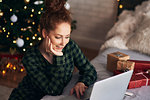 Woman shopping for Christmas presents online