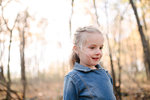 Little girl exploring forest