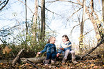 Sisters exploring nature in forest