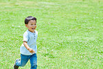 Japanese kid in a city park