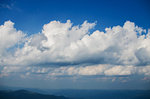 furry clouds on a blue sky on a beautiful summer weather