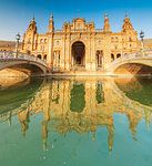 Panoramic of the old palace built in Neo-Mudejar style and Art Deco bridges on canal, Plaza de Espana, Seville, Andalusia, Spain, Europe