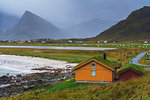 Houses with grass roof by the sea, Fredvang, Nordland county, Lofoten Islands, Norway, Europe