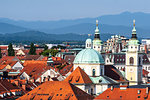 City rooftops with mountains, Ljubljana, Slovenia, Europe