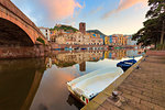 Moored boats in the river at sunrise, Bosa, Oristano province, Sardinia, Italy, Mediterranean, Europe