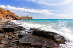 Wave breaks on the rocks. Cannai Tower(Torre Cannai), Sant'Antioco Island, Sud Sardegna province, Sardinia, Italy, Mediterranean, Europe