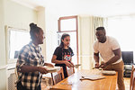 Brother and sisters setting the table