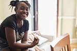 Portrait smiling, confident tween girl eating pizza