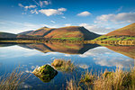 Skiddaw reflected in Tewet Tarn, Keswick, Lake District National Park, UNESCO World Heritage Site, Cumbria, England, United Kingdom, Europe