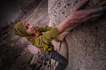 Climber trad climbing, Pine Creek, Bishop, California, USA