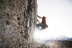 Climber trad climbing, Little Egypt, Bishop, California, USA