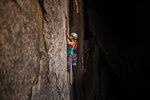 Climber rock climbing, Cookie Cliff, Yosemite National Park, California, United States