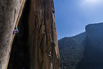 Climber rock climbing, Cookie Cliff, Yosemite National Park, California, United States