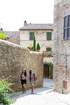 Friends exploring Città della Pieve, Umbria, Italy