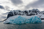 View of blue iceberg on coast, Burgerbukta, Spitsbergen, Svalbard, Norway