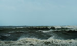 Large waves crashing on dutch shore on stormy day, Rotterdam, Zuid-Holland, Netherlands