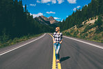 Woman in middle of road, Jasper, Canada