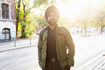 Indian man exploring city, Berlin, Germany